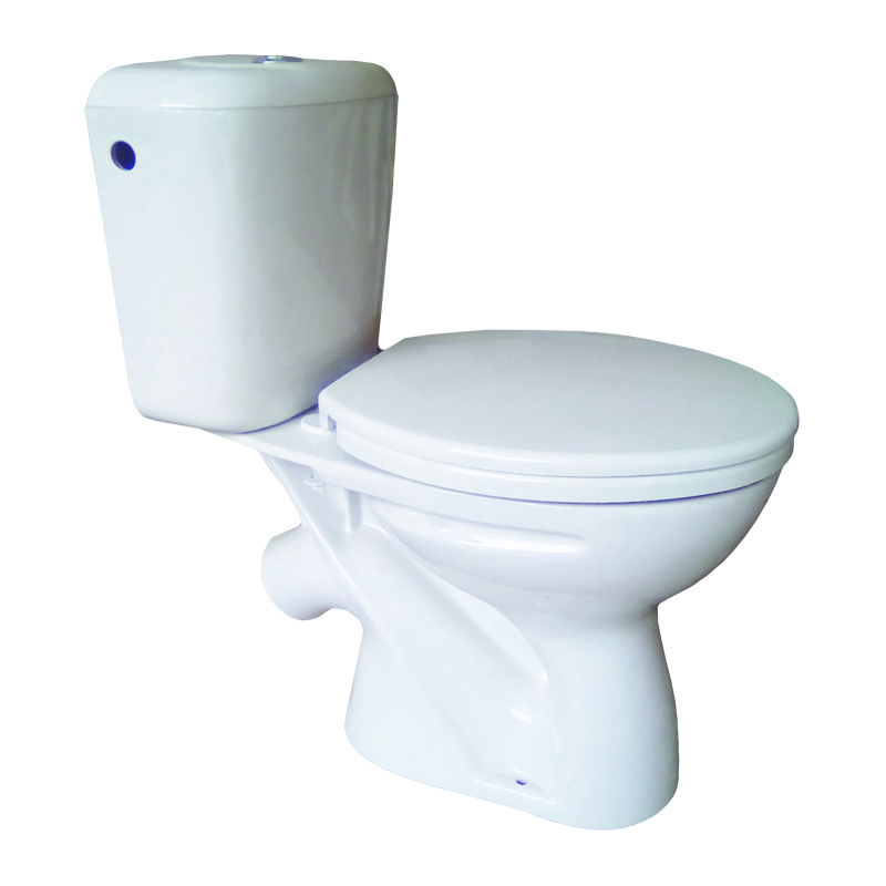 Унитаз-компакт "КАМЕЛИЯ" белый ниж. подв. косой выпуск с арматурой и сиденьем (г. Волгоград)